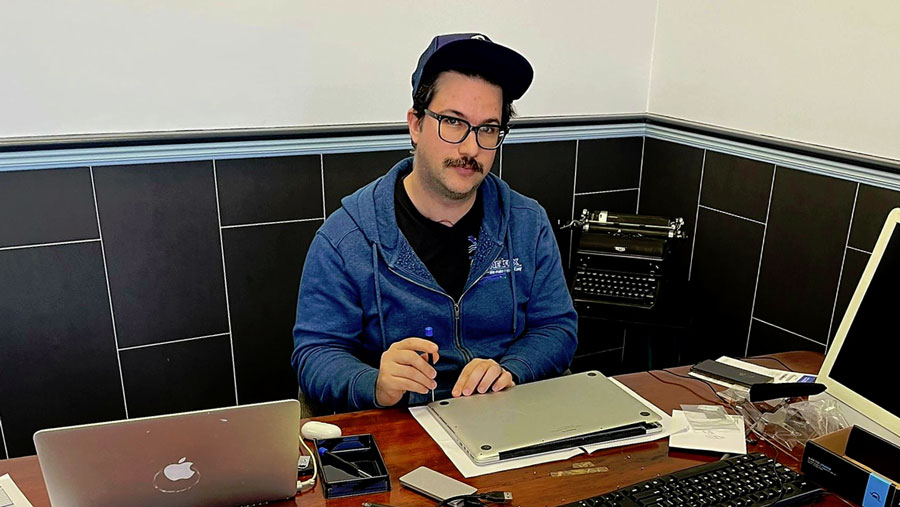 Laptop upgrade in progress: netEffx technician swaps out SSD for increased storage capacity